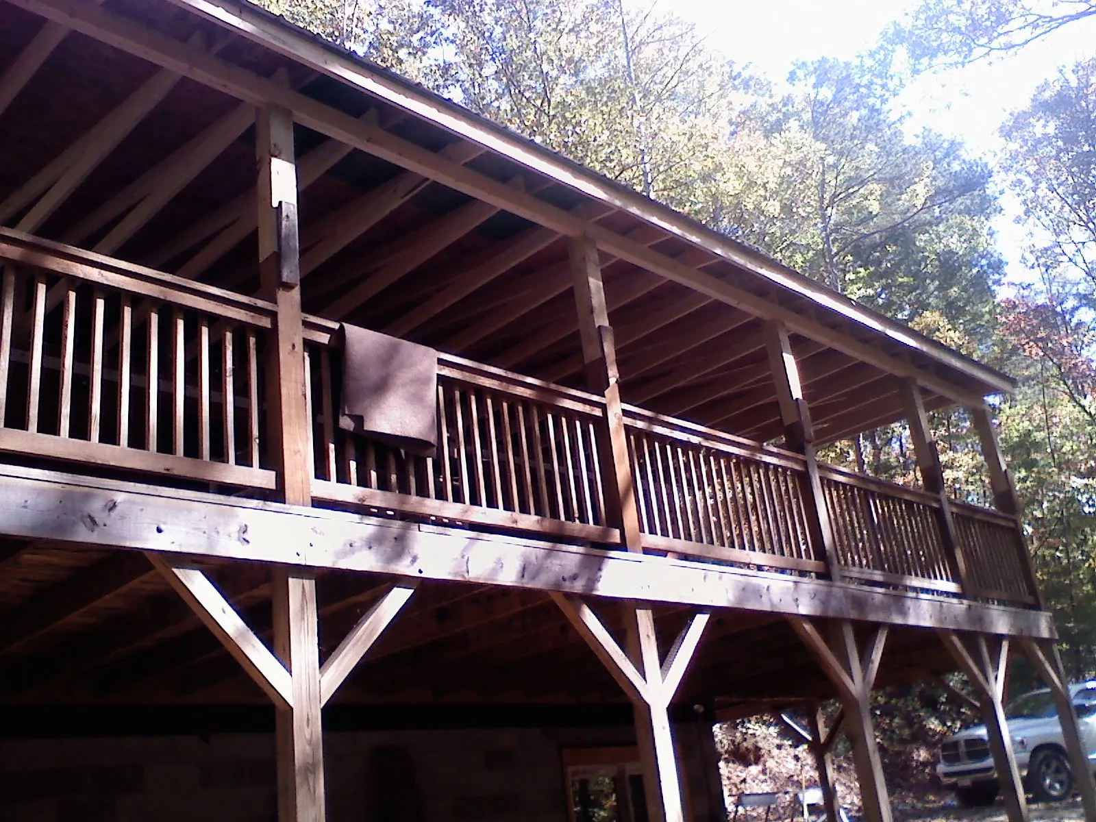 Timber framing under a new elevated porch and deck — Roof Leak Repair in Cambridge by Roofing Brothers